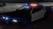 A Stanier LE Cruiser with lights and sirens activated. (Rear quarter view)