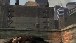 He dies from a bullet.