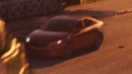 The front of a Willard sedan in the final shot of the second trailer.