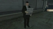 A pedestrian reading a newspaper. (Note: Both sides of the paper look the identical).