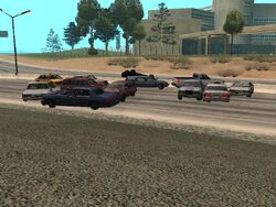 https://static.wikia.nocookie.net/gtawiki/images/5/55/LasVenturas-GTASA-TrafficJam.jpg/revision/latest/scale-to-width-down/250?cb=20150330195653