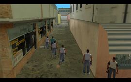 Tommy and the Cubans run further into the factory's compound.
