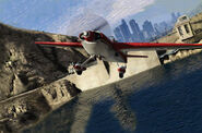 The Stunt Place flying over a dam in GTA V.