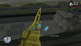 CJ must pick up a container with the crane.