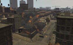 An aerial view of the building exploding.