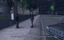 The Yardie talking to Claude tells Claude that he'll do the driving and the shooting while the Yardies will watch over him and cover him if needed, before handing Claude a gun.
