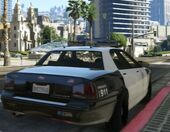 Rear view of a LSPD Police Cruiser with a glitched LED light bar.