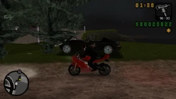 When arriving at the mansion, Salvatore's black Banshee can be found crashed into a pine tree.