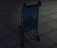 LSIA-GTAV-BaggageTrolleyBack.png (669 KB) Rear of baggage trolley at Los Santos International Airport in GTA V.