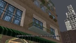 When he arrives, she is just finishing talking on the phone with someone.