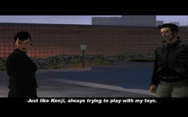 Asuka comments on Kenji trying to capitalize and Claude and jokingly says that Kenji always tries to play with her toys.