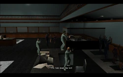 Tommy tells Phil to stay behind and take care of the hostages while him and Cam go and get the money from the vault.