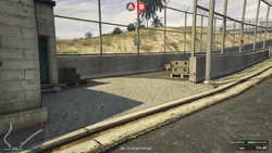 AssaultonATT16-GTAOe-AttackerLoadoutCrates1.png (4.24 MB) Initial Attacker loadout crates, at the east entrance to the base.