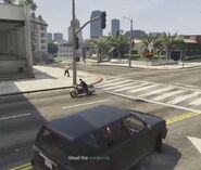 Vasquez riding past on her Police Bike (Original version, PS3).