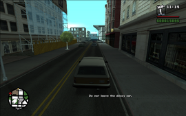 Carl must stay inside the decoy car, otherwise the Da Nang Boys may realize they're following a decoy.