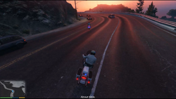Michael and Trevor chasing the cars.