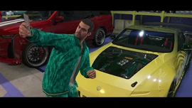 Jamal taking a selfie in front of a Euros.