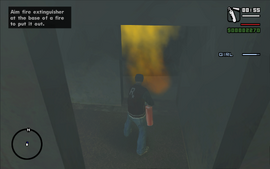 Carl using the fire extinguisher to clear the room's doorway.