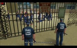 Shortly after Tommy starts the riot, the gate opens and the guards decide to calm the workers down.