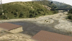 MurrietaHeightsSource-GTAV.jpg (97 KB) Entrance to the Murrieta Heights flood control gates.