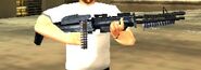 Toni Cipriani holding an M60 in Grand Theft Auto: Liberty City Stories