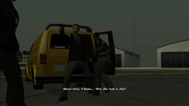 Toreno points a gun at CJ, as he doesn't know him.