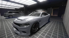 Agencies-GTAOe-FranklinsBuffaloSTX-FrontQuarter.png (2.41 MB) Franklin's Buffalo STX parked in the Agency Garage.(Rear quarter view)