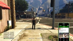 Text message with the photo of the target.