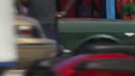 A potential double checkered flag emblem on the front fender.