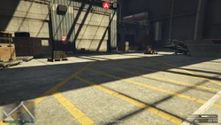 AssaultonATT16-GTAOe-AttackerLoadoutCrates2.png (3.29 MB) Attacker Loadout crates after destroying the first set of terminals, inside the large open hangar on the east side of the base.