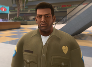 Tommy wearing the police uniform in the Grand Theft Auto: Vice City - The Definitive Edition.
