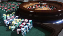 Roulette wheel and chips.