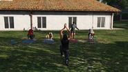 View of people doing yoga.