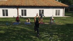View of people doing yoga.