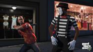 Trevor attacking a mime with a baseball bat.