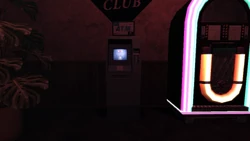 The Triangle Club ATM next to the jukebox.
