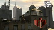 A closeup of the top of Majestic Hotel.