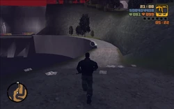 After taking the weapons of the fallen gangsters, Claude proceeds further to the dam.