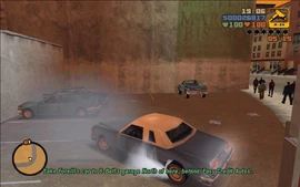 Claude is tasked with going to 8-Ball's garage in Harwood and placing a bomb in the car.