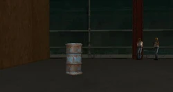 Two construction workers inside the building.