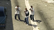 One is in an alleyway with other Ballas members on Carson Avenue in Chamberlain Hills.