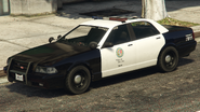 A Police Cruiser with LED roof lights.