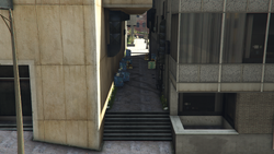 Alleyway behind the gallery connecting Power Street to the side stairwell and vehicle jump.