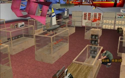 Zero is organizing items in his shop.