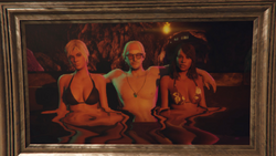 A picture from Juan Strickler's compound showing him with two women in the Richman Mansion.