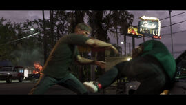 Jason throwing an NPC into the side of a car in the Starlet Motel's parking lot in the game's second trailer.