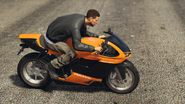 One is riding a Bati 801 around Pillbox Hill in Downtown LS.