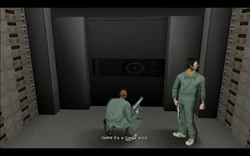 Cam takes a look at the safe and finds out that it's a Flange 9000 model, which could potentially take several hours to crack.