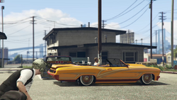 Driving off in his lowrider, still blasting "Black Privilege".