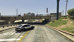 Drifting through an underpass, with cheering spectators